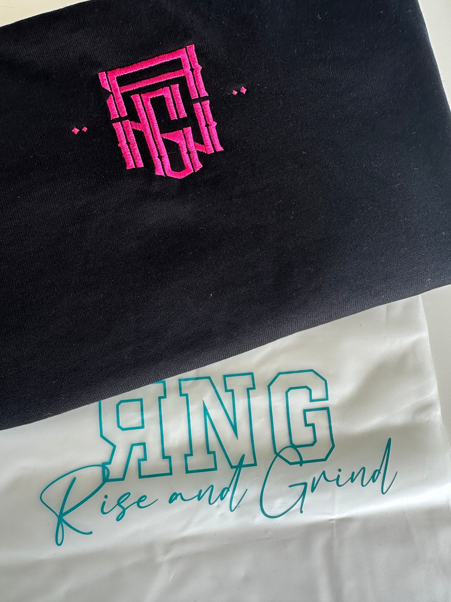 Black heavy oversized Rng monogram tee (neon pink embroidery)