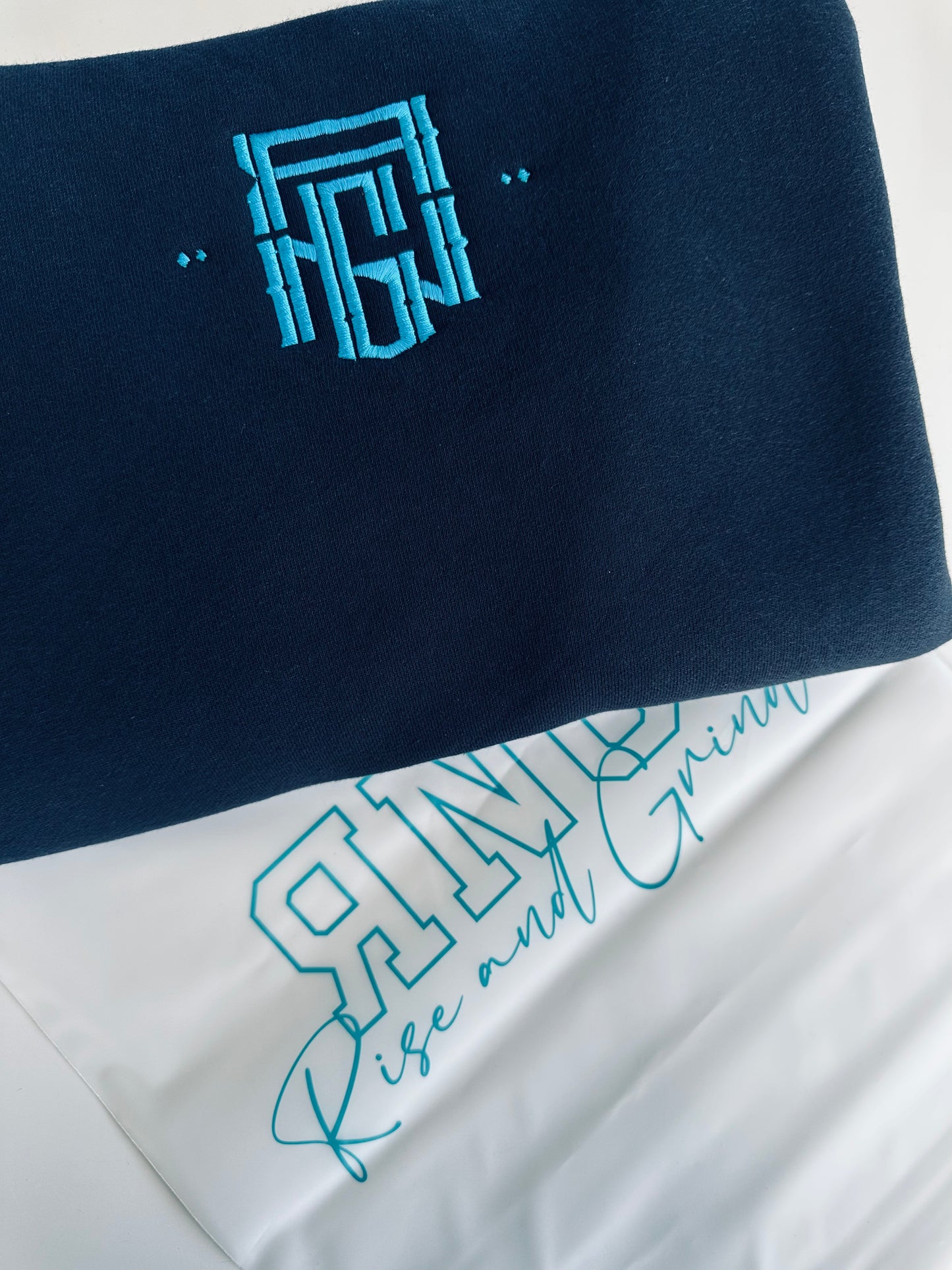 Black Rng monogram jumper (cyan blue embroidery)